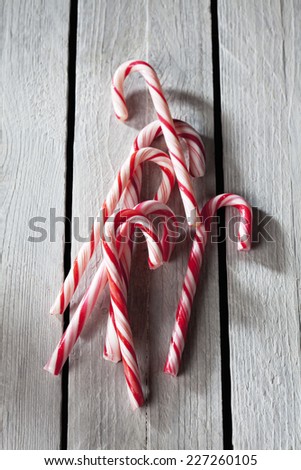 Sugar canes on wooden background