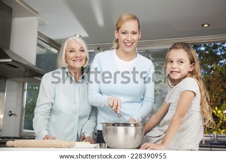 Granny, Mother and daughter baking in kitchen