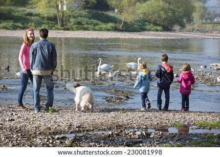 Family at the river