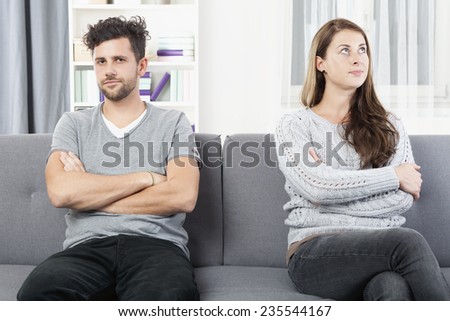 Young couple with relationship problems, annoyed by each other