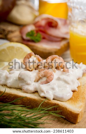 Toast bread with shrimp salad, dill and lemon