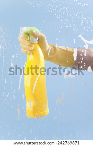 Person using cleaning agent