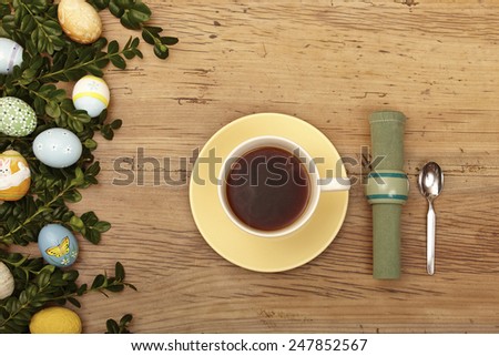 Easter decoration, coffee cup, napkin and spoon
