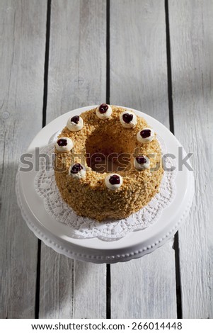 Frankfurt crown cake with crocant on cake stand