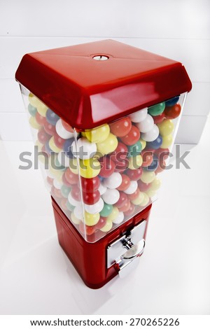 Full bubble gum machine on white background