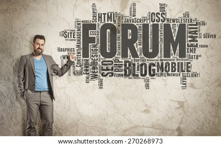Forum Word Cloud on Grunge Wall, Business Man as Presenter