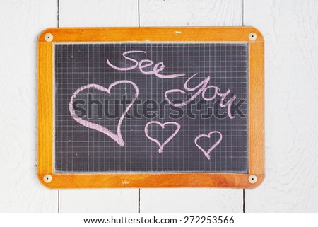 Blackboard with pink hearts, chalk writing, See you