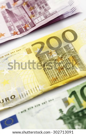 Various Euro bank notes in a row