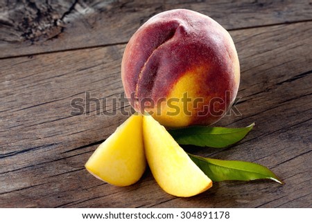Peach, piece and leaves