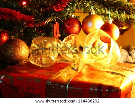 Decorated gift box under the Christmas tree