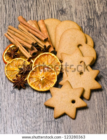 biscuits with  cinnamon and  orange dried on wooden table
