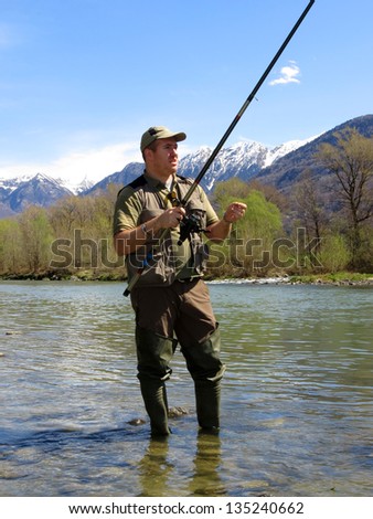 fisherman on river