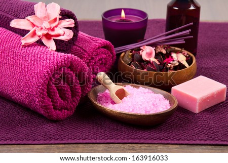 pink Spa tools with candle amd towel