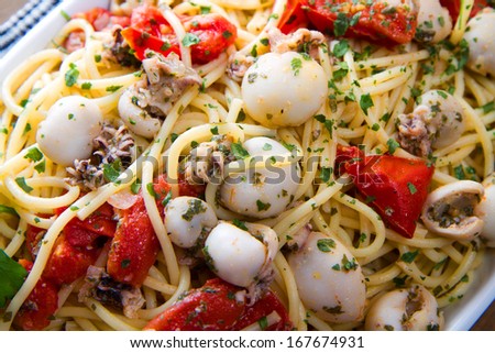 spaghetti with cuttlefish and tomatoes