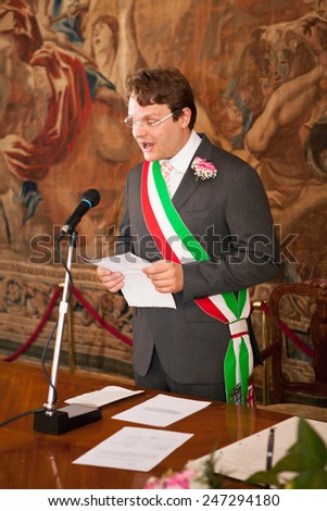 a italian mayor during a wedding celebration