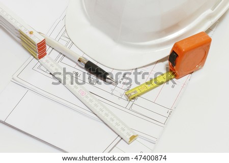 Architectural background with Drawing and various working tools