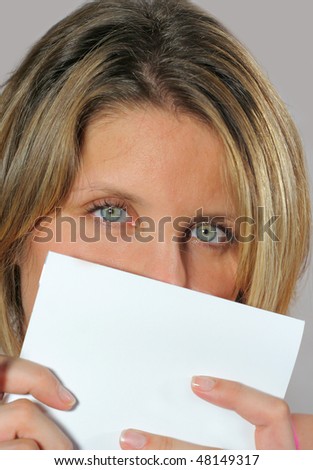 Pretty blonde woman with pen and block notes