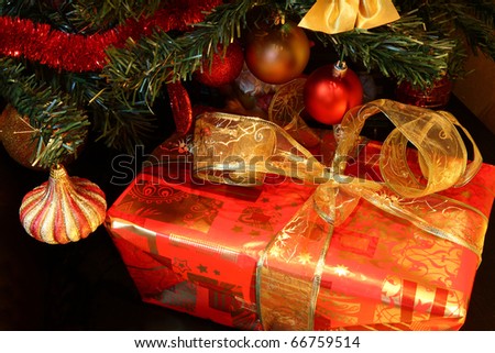Decorated gift box  under the Christmas tree