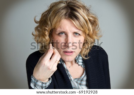 young woman gesturing do not know sign