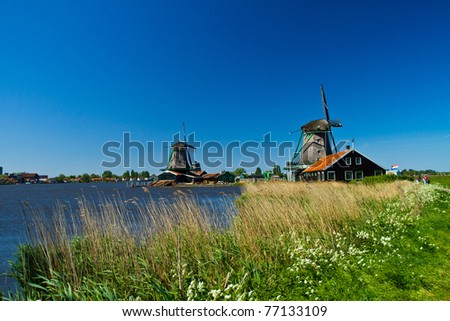 Photo of windmill in Holland with blue sky