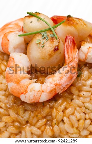 risotto with seafood sauce with scallops and prawns