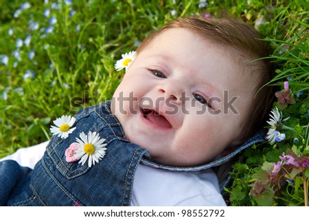girl lying on the flowery meadow