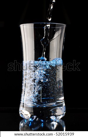 A water glass isolated on a black background