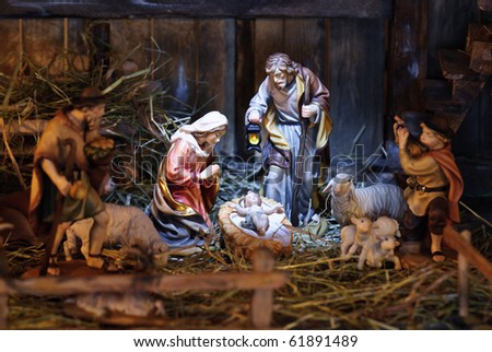 Free Logo Design on Shutterstock Nativity Scene With Hand Colored Figures Made Out Of Wood