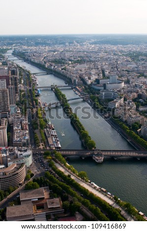 PARIS, FRANCE - MAY 28: Aerial view on river Seine and Isle of Swans from Eiffel tower on May 28, 2011, France. The Seine is a 776 km long river and an important tourist waterway within the Paris area