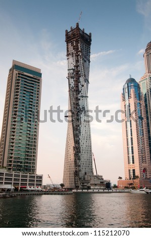 DUBAI, UAE - NOVEMBER 26: Infinity Tower - Highest twisting tower in the world, Dubai, United Arab Emirates, Nov 26, 2011 Dubai is the most expensive city in the Middle East.