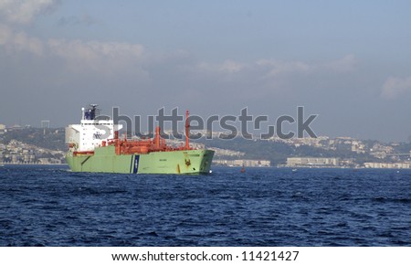 Big oil tanker in Bosphorus strait, Istanbul`s water area. Turkey.
