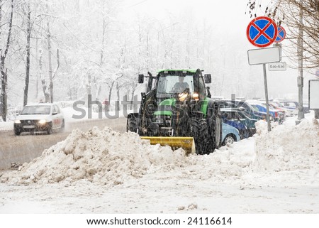 snowplough works during heavy snow in city