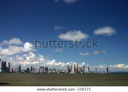 View of Panama City, Panama, with a blue sky and a contaminated sea.
