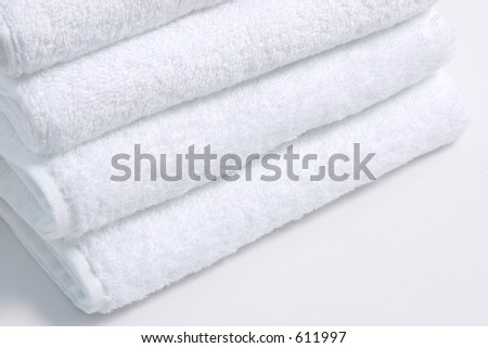 White towels over a white background.