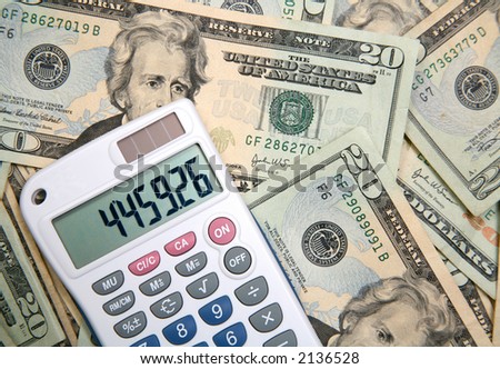 Calculator over money, determining costs and expenses.