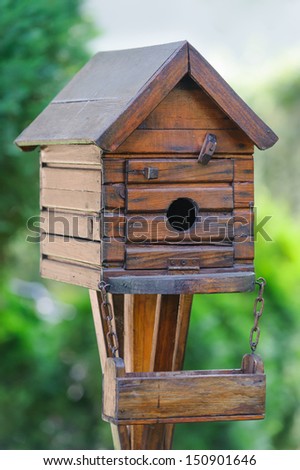 Little bird house at the garden
