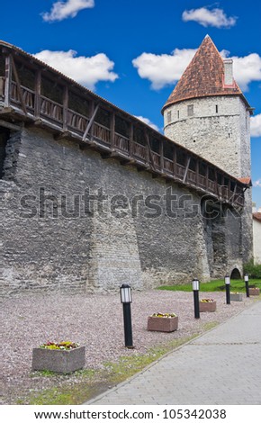Part of old city wall and Golden Leg Tower (Kuldjalatorn) in Tallinn, Estonia
