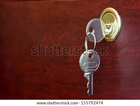 Key in door lock close up
