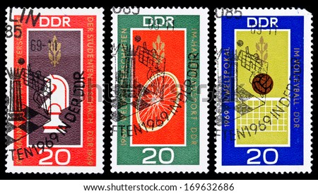 GDR - Circa 1969: Set of GDR stamps dedicated to Students  chess world championship in Drezden, Volleyball world cup in Erfurt and Track cycling world championship in Erfurt, East Germany, circa 1969.
