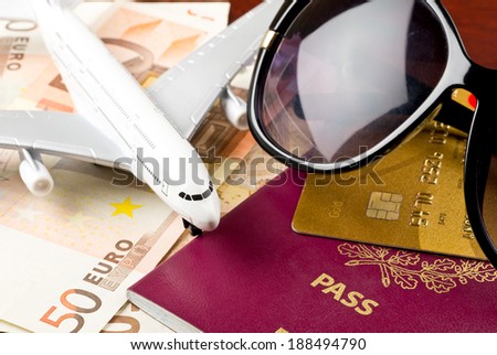 Travel concept with money documents and sunglasses