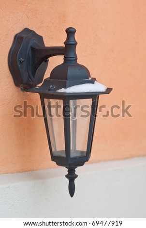 Old-fashion street lighting on the wall