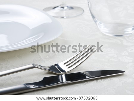 table setting for dinner. See more my cutlery photos: http://www.shutterstock.com/sets/65705-cutlery.html?rid=522649