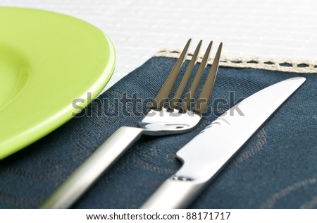 Dinner setting close up view. See more my cutlery photos: http://www.shutterstock.com/sets/65705-cutlery.html?rid=522649