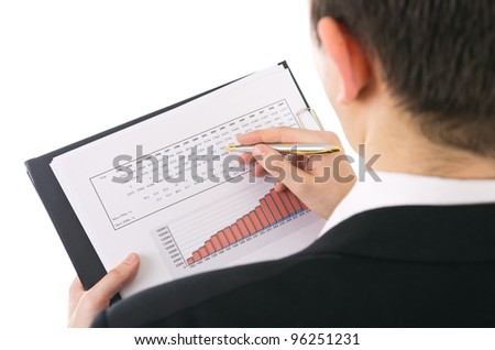 Businessman checking company income evaluation from previous years.