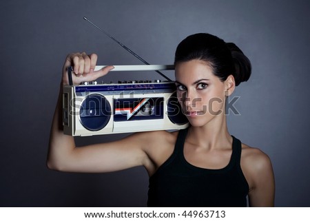 Woman with retro Boom Box