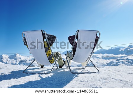 Couple at mountains in winter Val-d'Isere Alps France Couple at mountains in winter Val-d'Isere Alps France