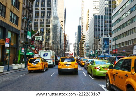 NEW YORK CITY - MARCH 28: Yellow taxi at street,  March 28 2014 in New York, USA