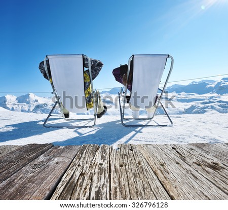 Couple at mountains in winter, Val-d\'Isere, Alps, France