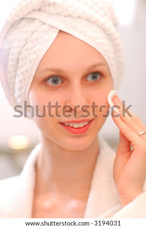 Woman in towel. Soft focus, shallow depth of field.