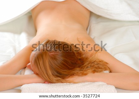 Woman with towel. Soft focus, shallow depth of field.